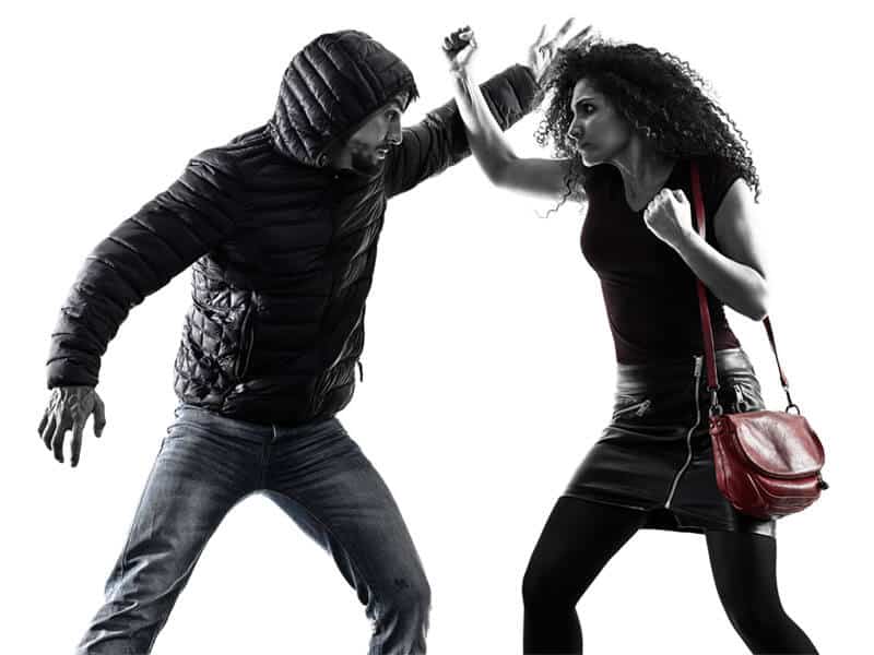 Self-Defense Program for Adults in __CITY__ __STATE__ - Blocking Punch Woman